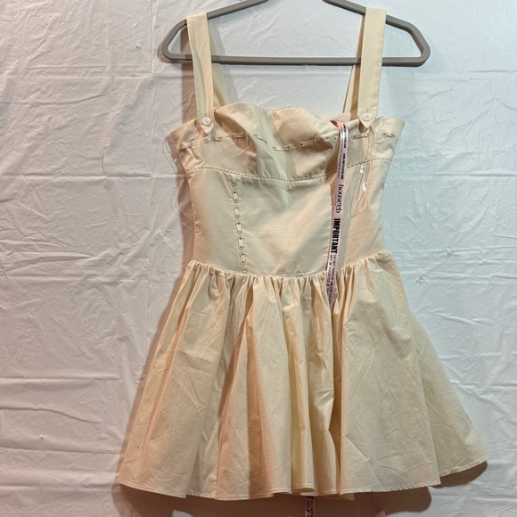 House of CB Dresses & Skirts - House of Cb - Brand New! Cream Sleeveless Mini Dress
